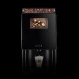 Kaffeemaschine "miniBona2" von Kaffee Partner auf schwarzem Hintergrund
